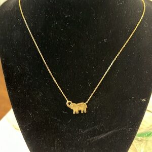 Gold tone elephant necklace